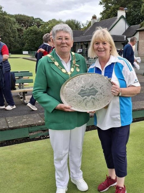 PTWBA President Margaret Paul receives Senior Inter   Association 2025 Runners Up Trophy from IWBA President Angela THompson